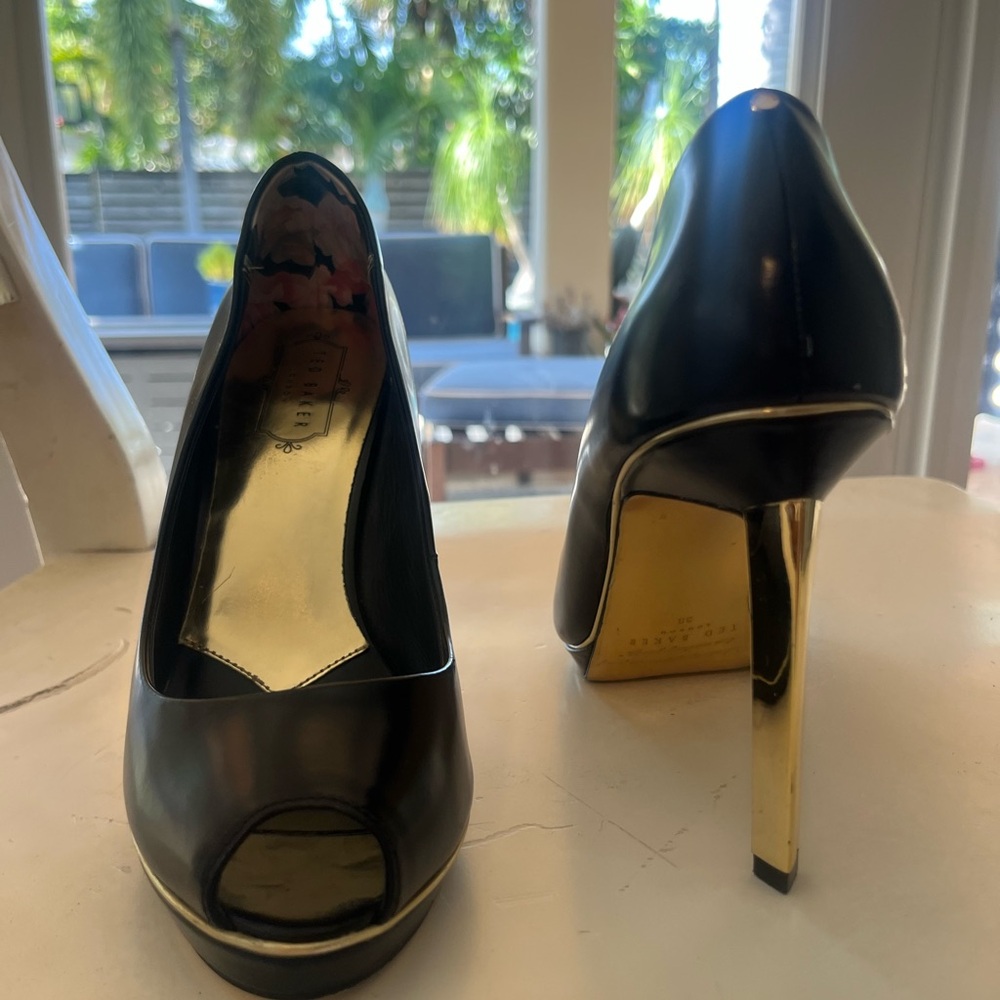 Ted Baker Black with gold spiked high heel platform shoes. Size 7.5